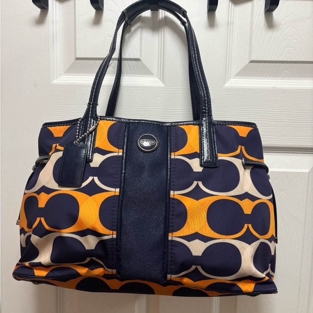 Coach E1326-F23902 Taylor Signature Op Art Navy & Orange Linear Carryall in GUC